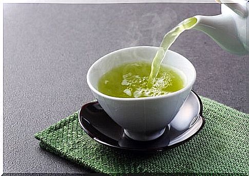 To lose weight with green tea, pour a cup of the hot drink.